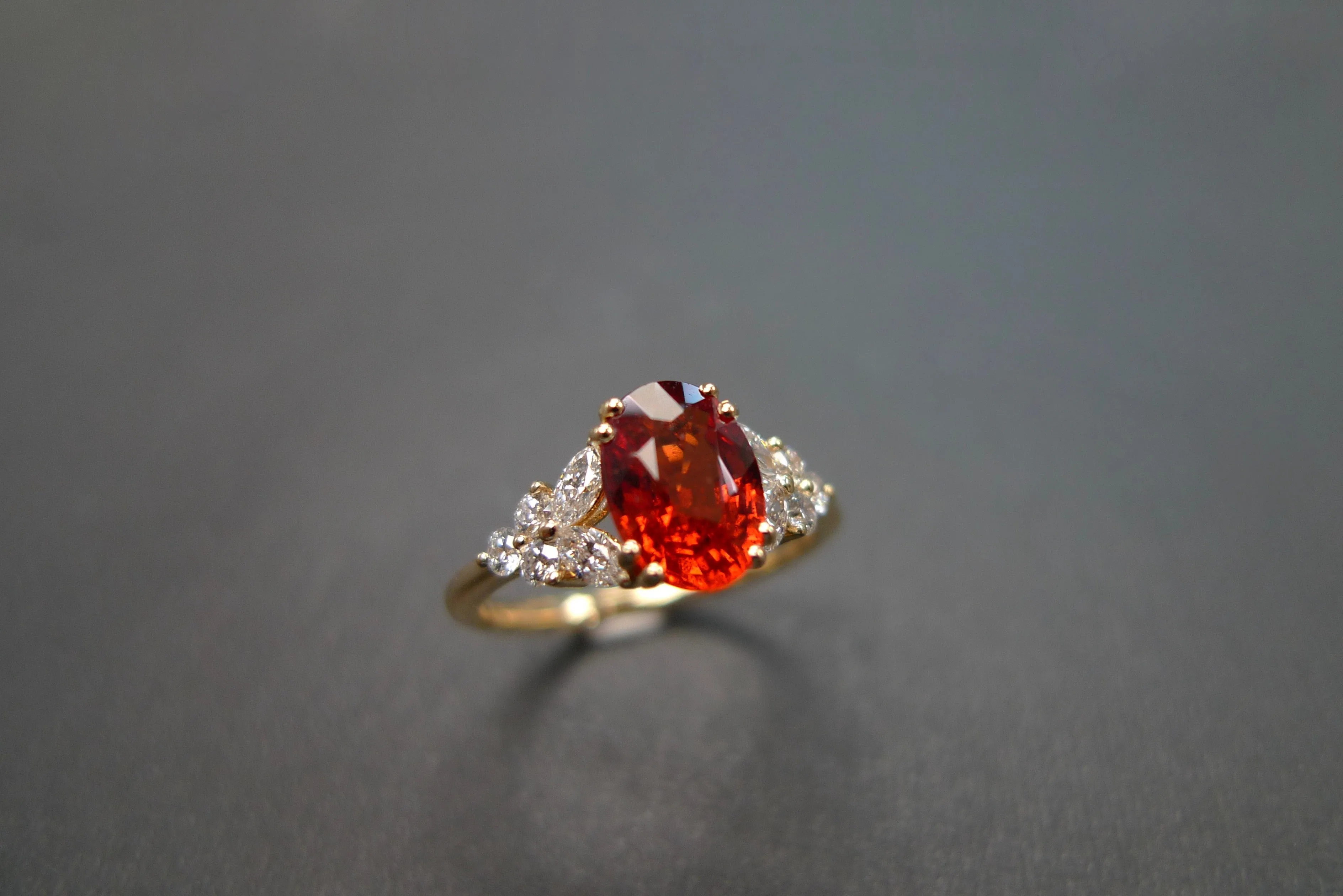 Oval Cut Orange Sapphire and Diamond Ring in Yellow Gold