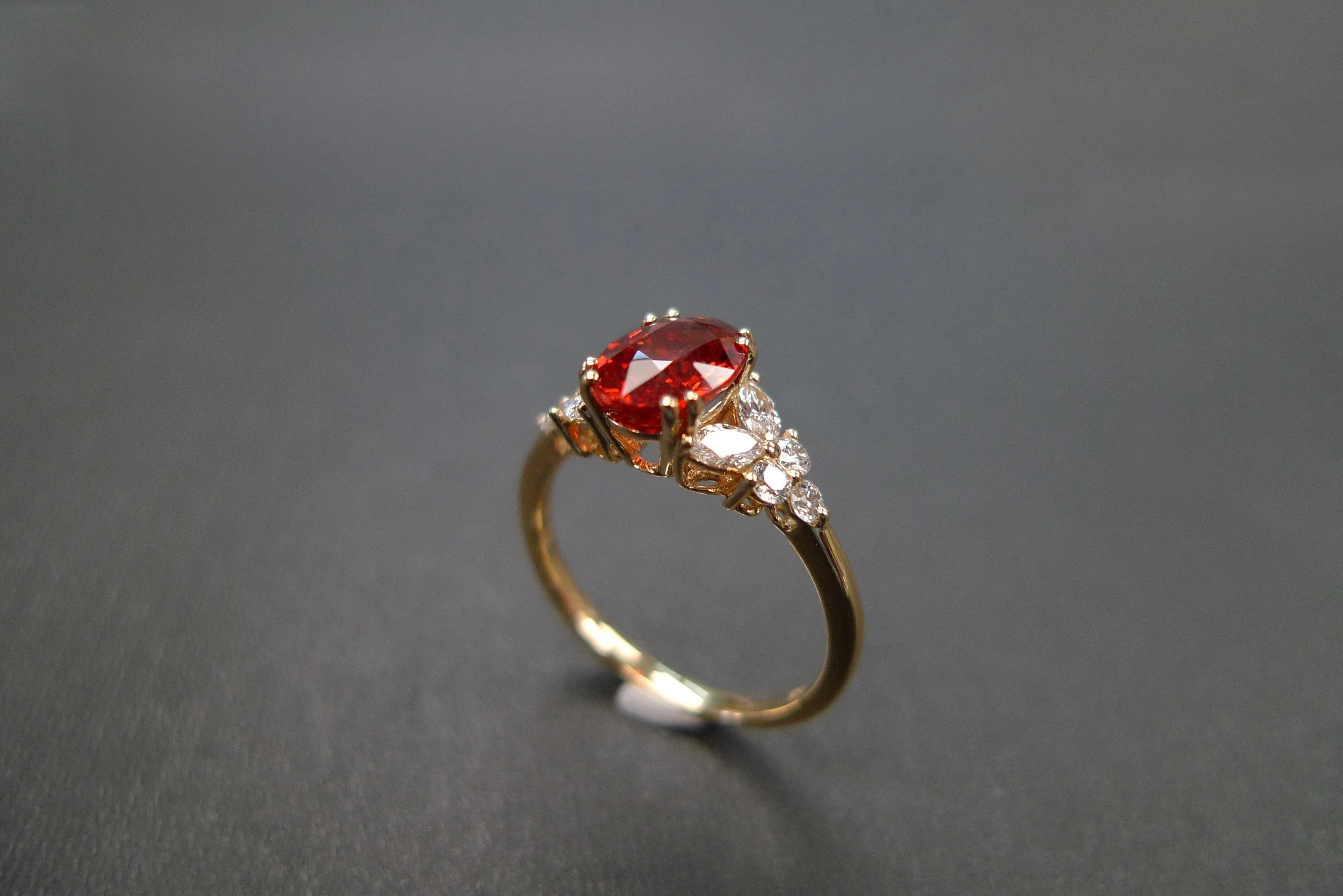 Oval Cut Orange Sapphire and Diamond Ring in Yellow Gold