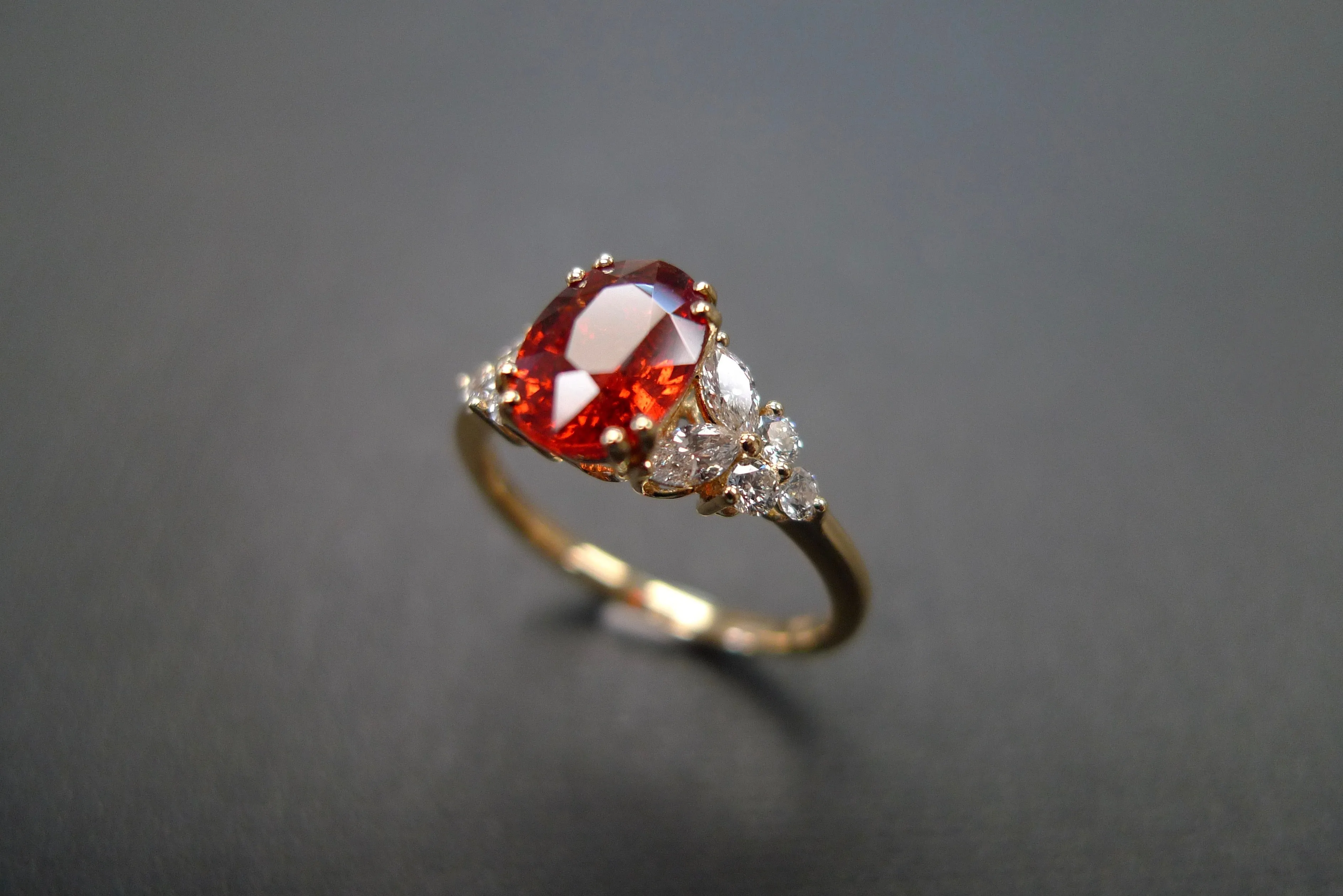 Oval Cut Orange Sapphire and Diamond Ring in Yellow Gold