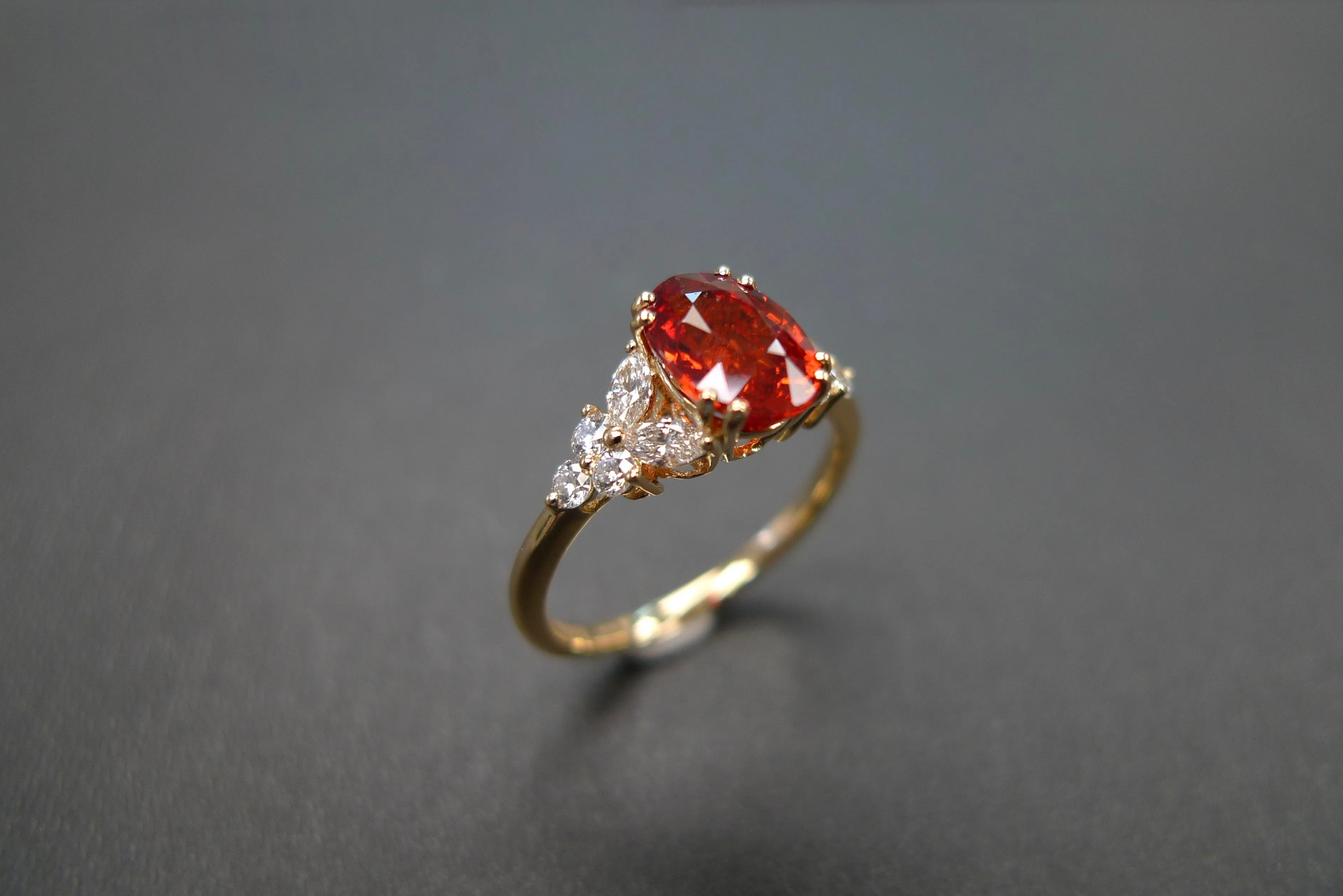 Oval Cut Orange Sapphire and Diamond Ring in Yellow Gold