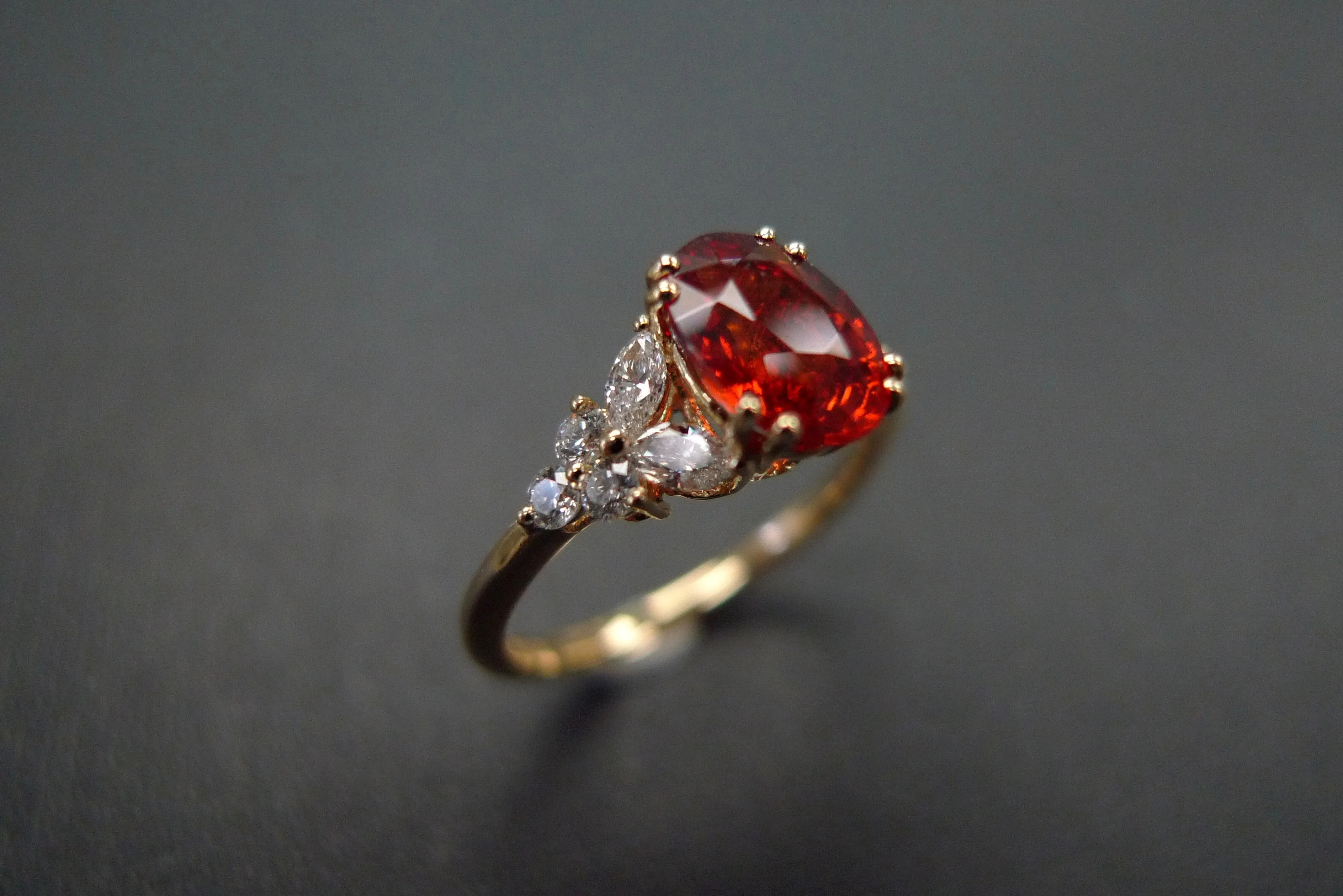 Oval Cut Orange Sapphire and Diamond Ring in Yellow Gold