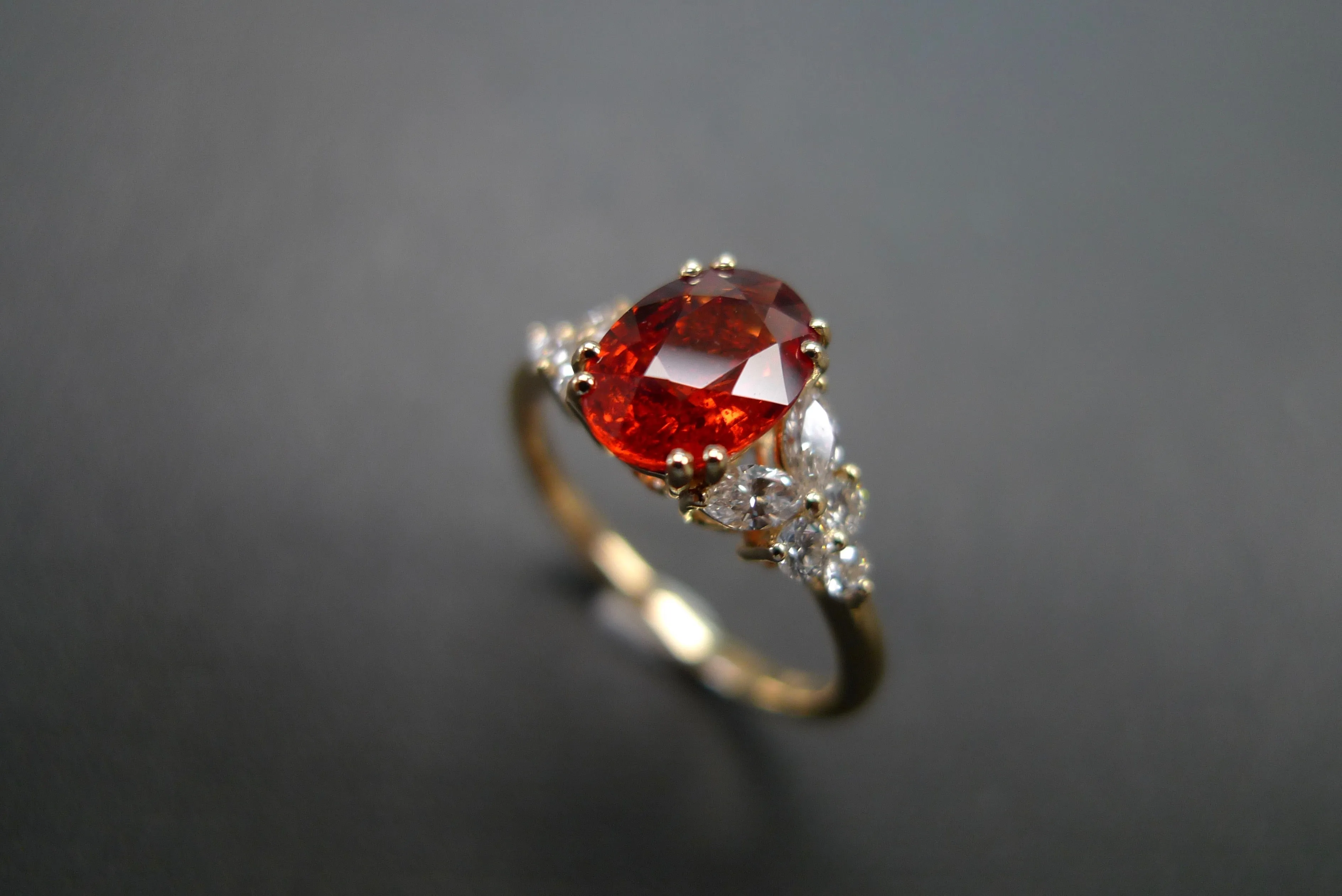 Oval Cut Orange Sapphire and Diamond Ring in Yellow Gold