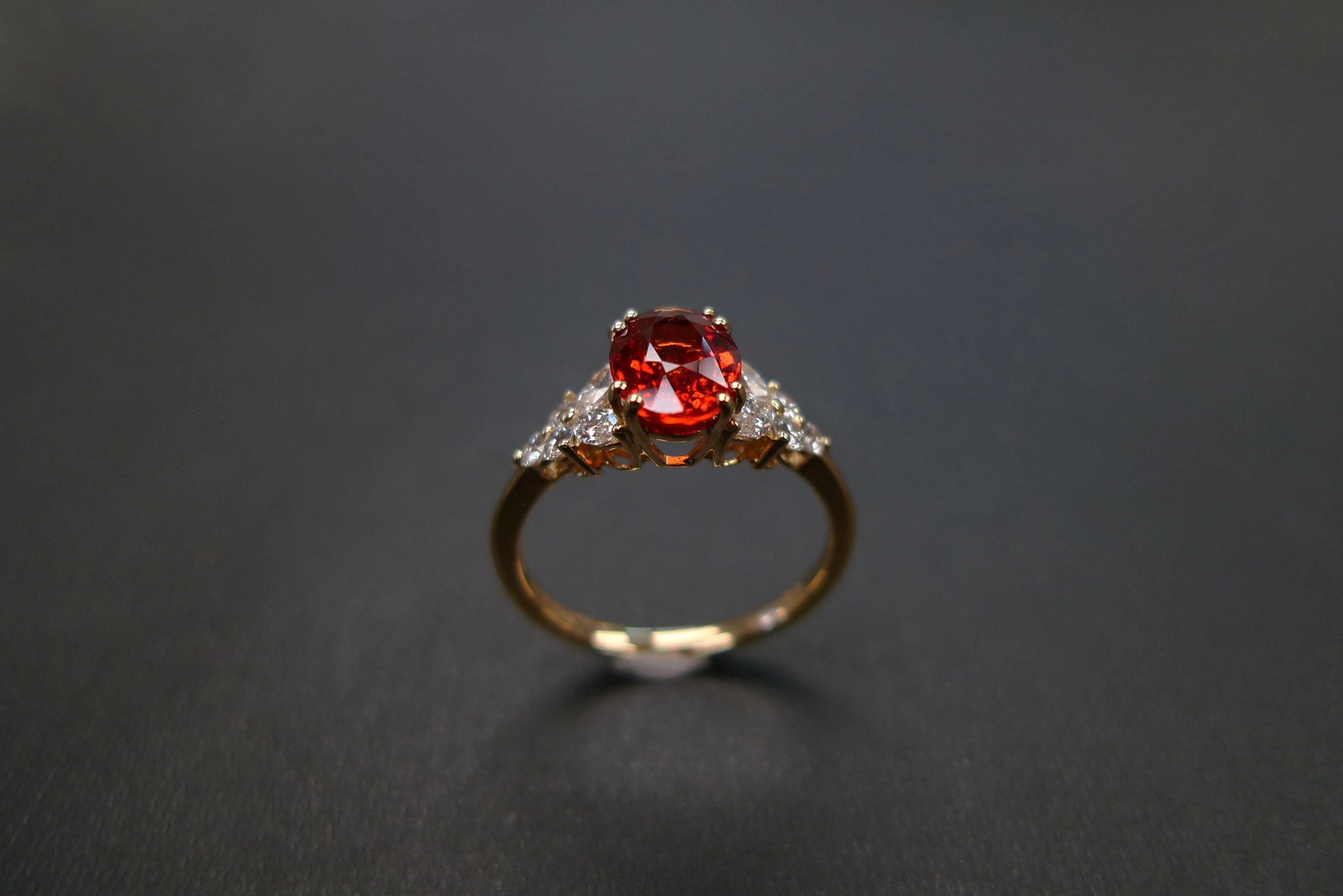 Oval Cut Orange Sapphire and Diamond Ring in Yellow Gold